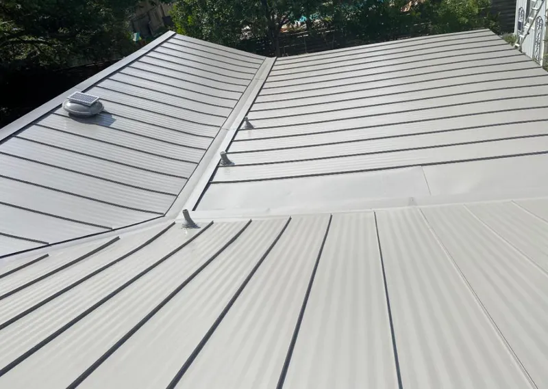 Solar attic fan installed on a metal roof for Roof Ventilation in Eagle Mountain